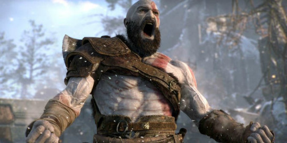 Kratos stands menacingly with axe