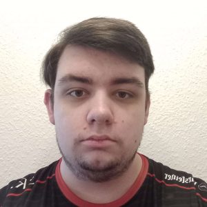 Man in black shirt headshot